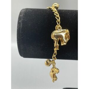 Avon Vintage Gold Tone Elephant and Ball Charm Bracelet Animal Theme 7.5 Inch